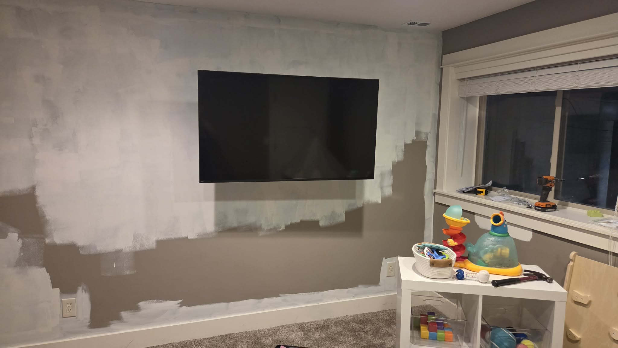 Mounted flat screen TV with clean setup in Spring Lake MI